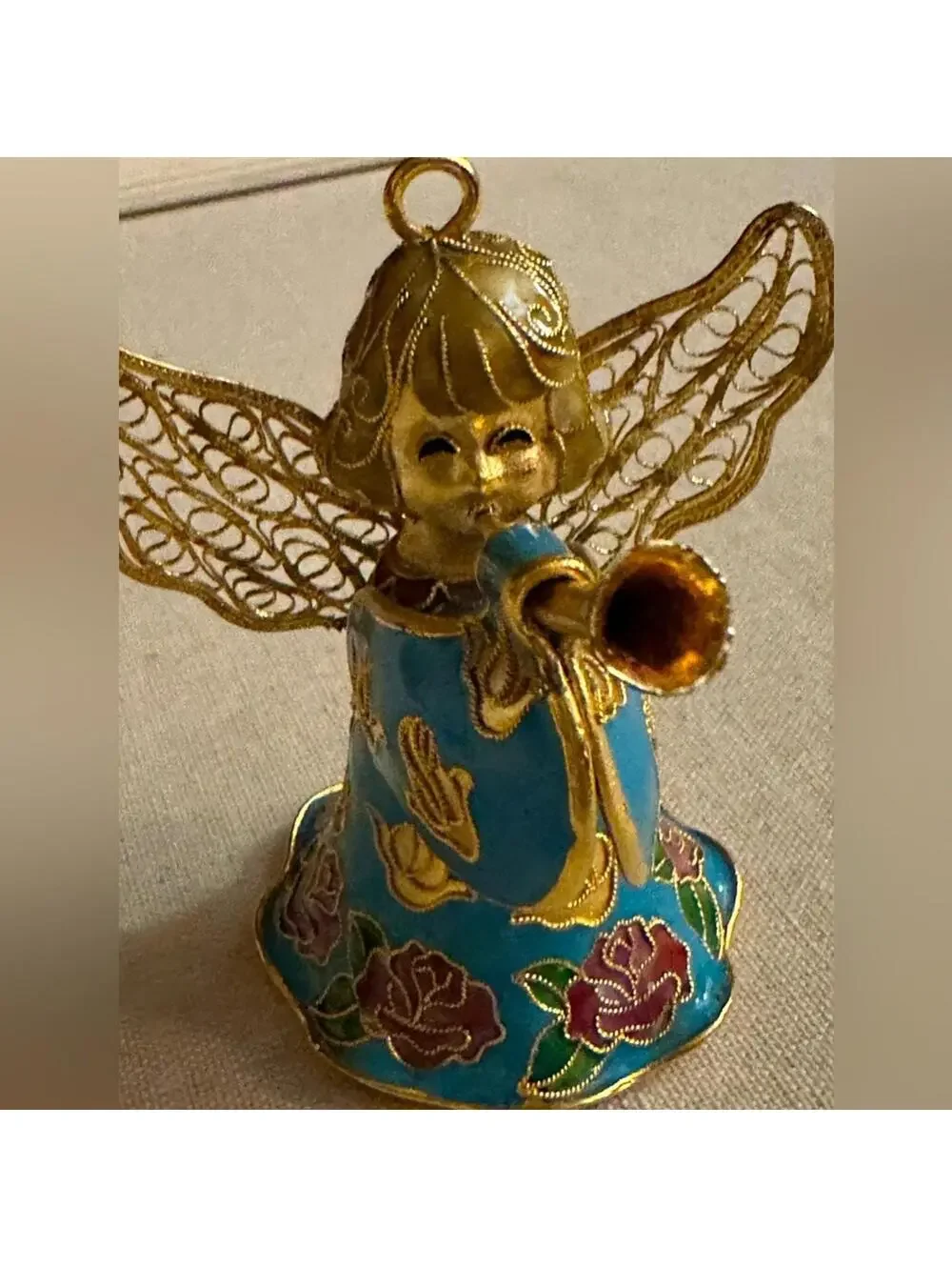 Vintage hand painted and glazed ceramic angel with trumpet 3d details